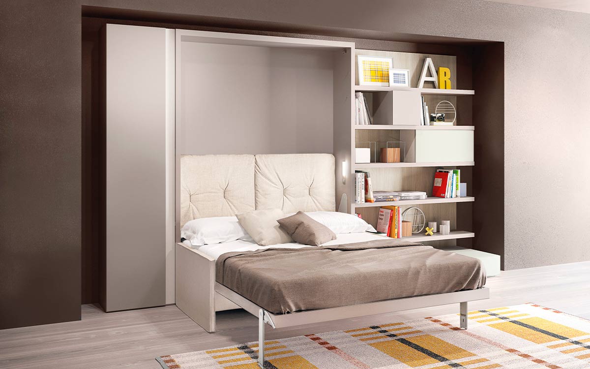 Mueble cama abatible autoportante con sofá frontal y comoda apertura vertical patentada.